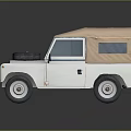 Vintage White Off Road Car Featuring Canvas Top Spare Tire on Front Classic Design