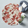Stylish Living Room With Red And White Geometric Round Area Rug Sofa Pillow And Plants