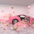 Pink Sports Car Surrounded By Colorful Balloons And Flower Petals In Room