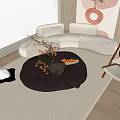 Curved Beige Sofa And Round Coffee Table Set With Decorative Items In Modern Living Room