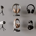 Various Over Ear Headphones In Black And Beige With Mic Stands On