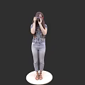 Woman Taking Photo With Camera On White Round Platform Wearing Floral Top Jeans Black Background