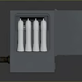 Gray Enclosed Industrial Equipment Featuring Internal Mechanical Components And Pipes