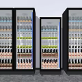 Three Commercial Glass Door Display Refrigerators Stocked With Various Bottled Beverages