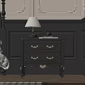 Stylish black carved nightstand with table lamp and woven headboard in bedroom