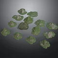 Multiple Green Mountain Models Arranged Around Central Stone With Natural Design
