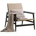 Modern Leisure Chair With Dark Wooden Frame Light Cushion Gray Pillow And Woven Blanket