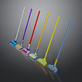 Colorful Mops With Long Handles And Various Colored Heads On Dark Background