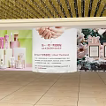 Outdoor Advertisement In Store Display With Perfume Bottles Skincare Products Flowers And Hand Care