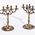 Two Vintage Brass Candelabra With Multiple Arms And Ornate Base Design