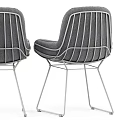 Modern Soft Gray Fabric Upholstered Armchair With Stylish Metal Wire Frame For Cozy Dining Spaces
