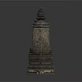 Two Ancient Stone Sculptures With Intricate Tower Shaped Design And Detailed Patterns