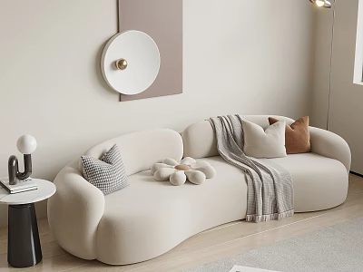 Beige Curved Multi Person Sofa With Decorative Pillows Throw Blanket And Wall Art 3d model