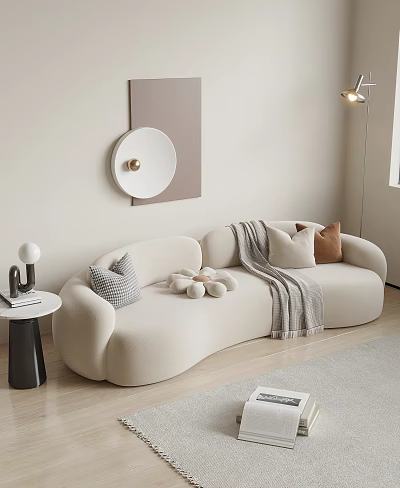 Beige Curved Multi Person Sofa With Decorative Pillows Throw Blanket And Wall Art 3d model