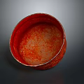 Red Carved Bowl Sculpture With Intricate Surface Texture And Smooth Curved Edges