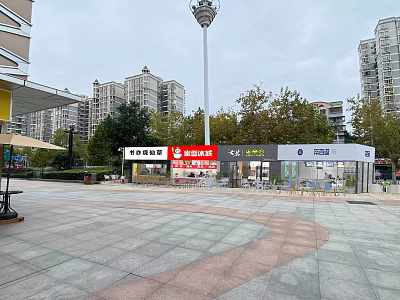 Vibrant Commercial Street With Retail Shops Plaza And High Rise Buildings 3d model