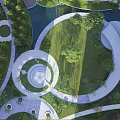 Residential Landscape With Circular Lawn Winding Paths Water Features And Lush Greenery