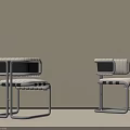 Modern Dining Chairs With Sleek Metal Frame And Striped Fabric Seat Cushions