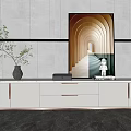 Modern White TV Stand with Decorative Vase Green Plant and Painting on Light Gray Wall