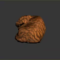 Curled Up Carved Orange Tiger Sculpture With Black Stripes And Fierce Expression