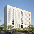 Modern Office Building With White Exterior Glass Windows And Trees Along Road With Cars