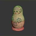 Traditional Russian Matryoshka Doll With Hand Painted Floral Patterns And Pink Base