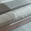 Modern Bedroom Interior Featuring Comfortable Bed Striped Rug Artwork With Letter R And Window Blinds
