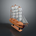 Detailed Wooden Sailboat Model With Multiple White Sails On Black Display Base