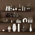 Stylish Modern Decorative Ornament Collection with Metallic Vases Sculptures and Books on Brown Shelves
