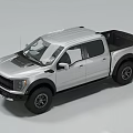 Silver Pickup Truck With Crew Cab Large Off Road Tires Black Grille And Cargo Bed