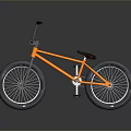 Orange BMX Bicycle With Black Handlebars Brown Seat And Wide Tires