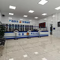 Police Service Hall Interior With Service Counter Seats Digital Screens And Signs