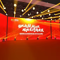 Formal Auditorium Interior With Red Stage Beige Seats And Stage Lights