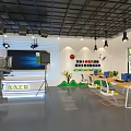 Mall Store Exhibition Hall Featuring Multi-Treasure Cabinets Photography Lights Green Carpet And Woman Walking