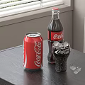 Refreshing Coca-Cola Beverage with Can Bottle and Glass Filled with Ice Cubes on Table