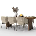 Wooden Dining Table Set With Woven Chairs Featuring Vase And Fruit Basket