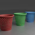 Three Colored Decorative Ornament Set With Perforated Design In Red Green Blue