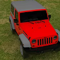 Red And Gray Off Road Vehicle With Classic Design Parked On Green Grass Field