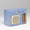 Vintage Light Blue Digital Radio With Gold Knobs And Retro Speakers