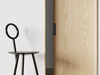 Black Dining Chair With Round Backrest Three Legs Near Light Wood Grain Door And White Wall 3d model