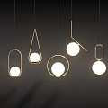 Modern Minimalist Chandeliers With Various Shapes Golden Frames And White Shades Hanging Against Dark Background