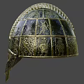 Ancient Ornate Helmet Featuring Intricate Metallic Patterns And Gold Decorative Details