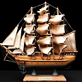 Decorative Ornament Set Featuring Wooden Sailing Ship Model with Detailed Sails on Stand Base