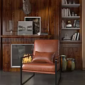 Brown Leather Single Sofa In Living Room With Wooden Wall Fireplace And Bookshelf Decor
