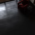 Dark Polished Wooden Floor With Red Chair And Side Table In Modern Living Room