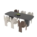 Black Rectangular Dining Table With White And Brown Chairs And Fruit Bowl
