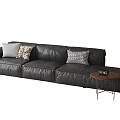 L Shaped Black Leather Sectional Sofa With Decorative Pillows And Side Coffee Table