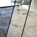 Modern Marble Texture Tile Floor Interior With Gray Beige Pattern And Metal Chair Legs