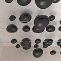 Modern Ceiling Design With Black Circular Decorations in Regular Pattern