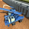 Blue Crawler Type Utility Vehicle With Long Arm And Pipeline At Construction Site
